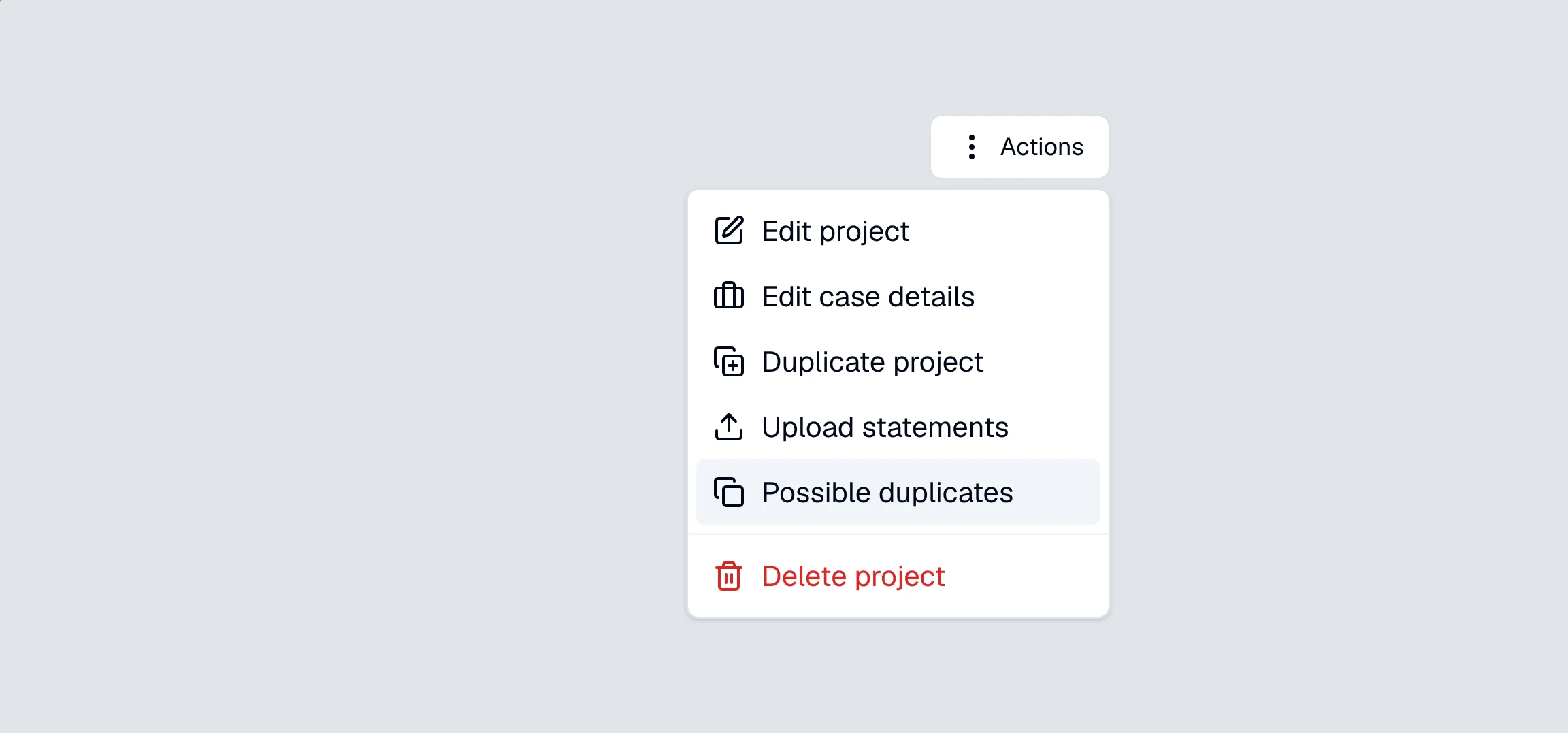 CounselPro project Actions menu open with the "Possible duplicates" item ringed, below Edit project, Edit case details, Duplicate project, and Upload statements.